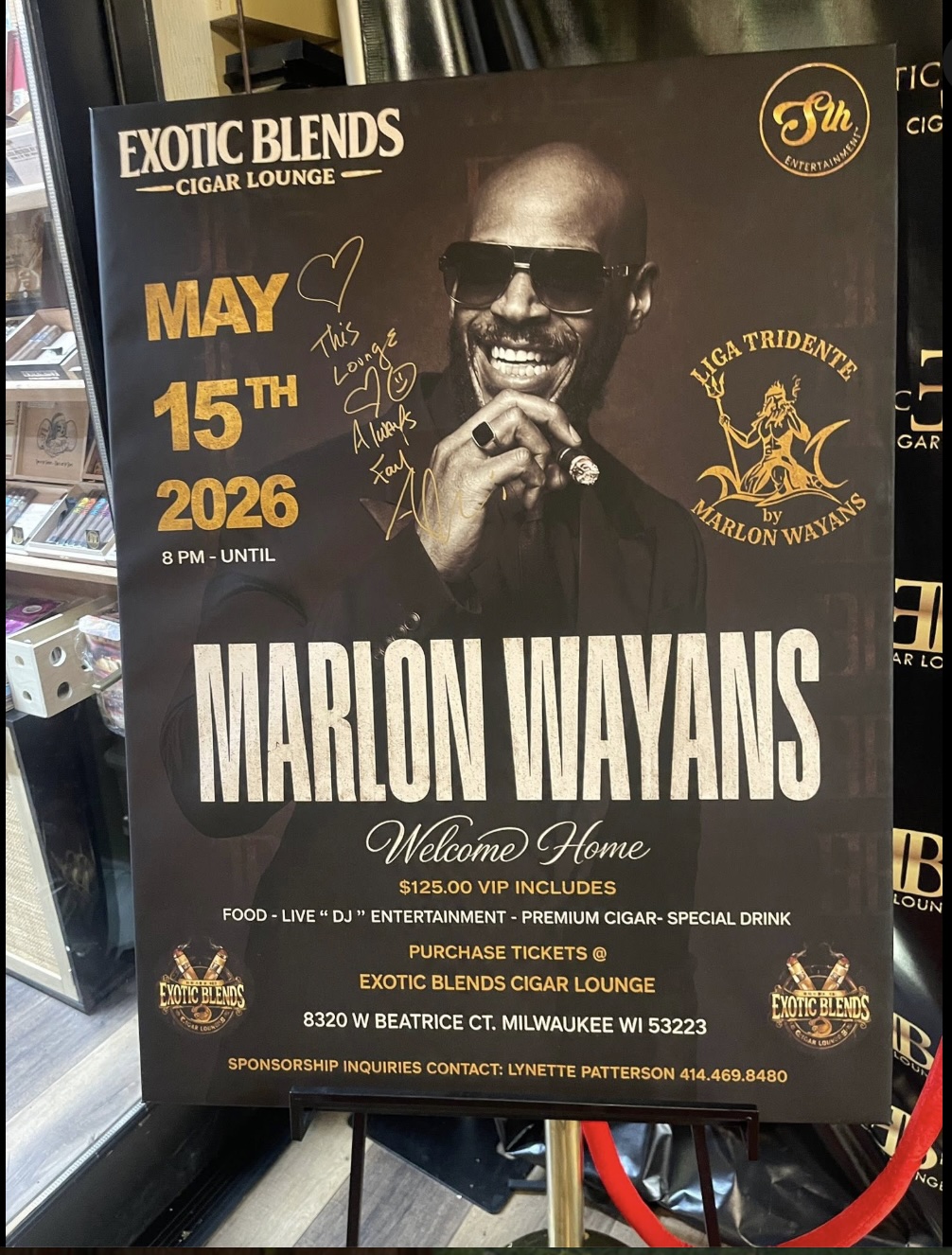 The signed Marlon Wayans Welcome Home event poster displayed at BSMU
